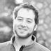 Black and white headshot of SEO expert Harris Schachter smiling outdoors