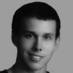 Black and white headshot of link building expert Jon Cooper