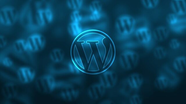 WordPress logo glowing in blue neon light against a dark background with repeated W symbols